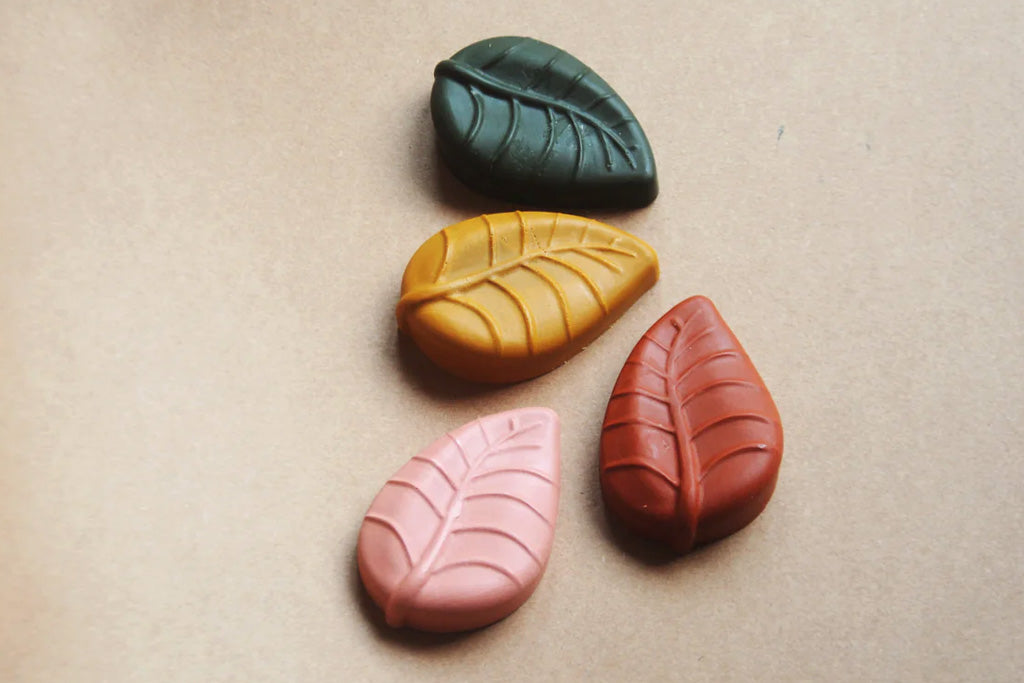 4 organic beeswax jumbo crayons for toddlers laying on craft paper