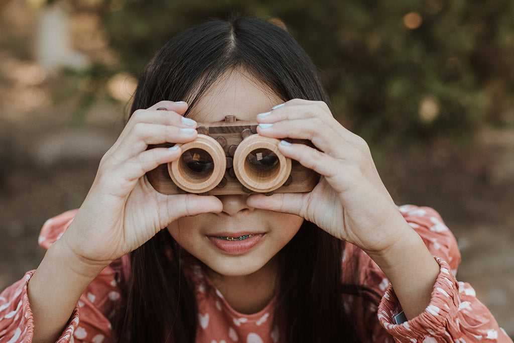 Twinkle wooden toy camera inspired by the stereo camera offers double the fun with two kaleidoscope lenses. Like a wooden binocular toy, Father’s Factory twinkle wooden toy camera has 2 lenses. Children can look through the lenses and find wonders. The kaleidoscopic lens will enhance creativity in children and offers high-quality playtime. Father's factory wooden toys can double as interior decor, kid’s room decor, and playroom display.