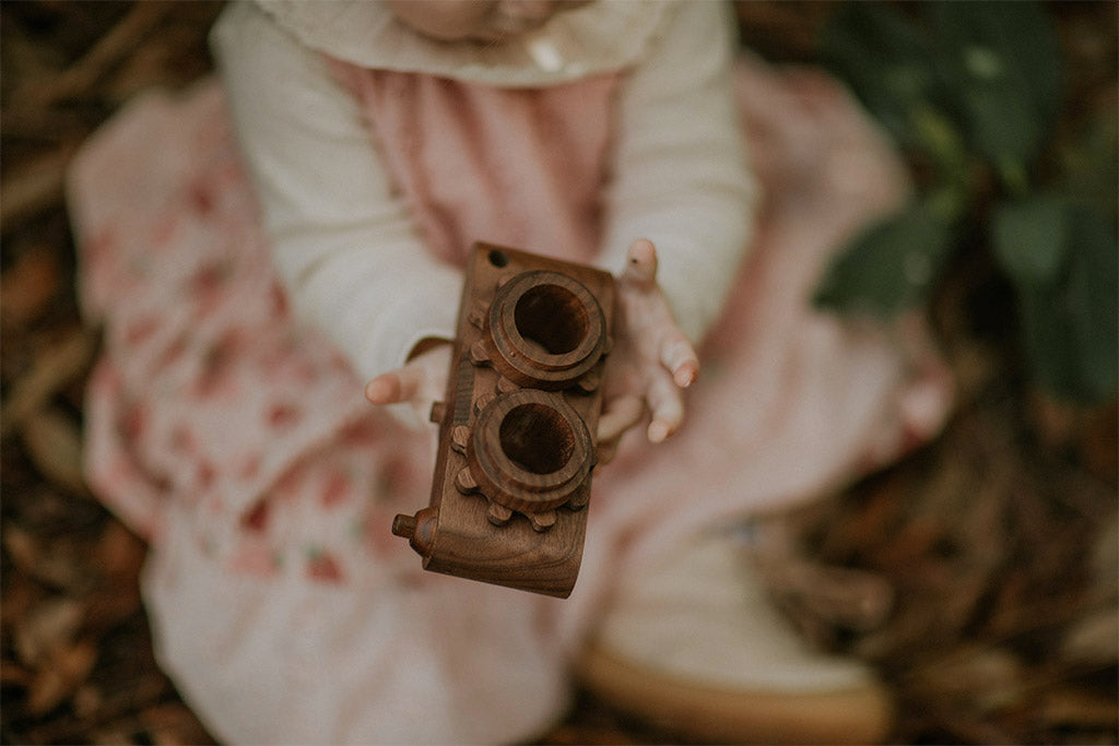Twinkle wooden toy camera inspired by the stereo camera offers double the fun with two kaleidoscope lenses. Like a wooden binocular toy, Father’s Factory twinkle wooden toy camera has 2 lenses. Children can look through the lenses and find wonders. The kaleidoscopic lens will enhance creativity in children and offers high-quality playtime. Father's factory wooden toys can double as interior decor, kid’s room decor, and playroom display.