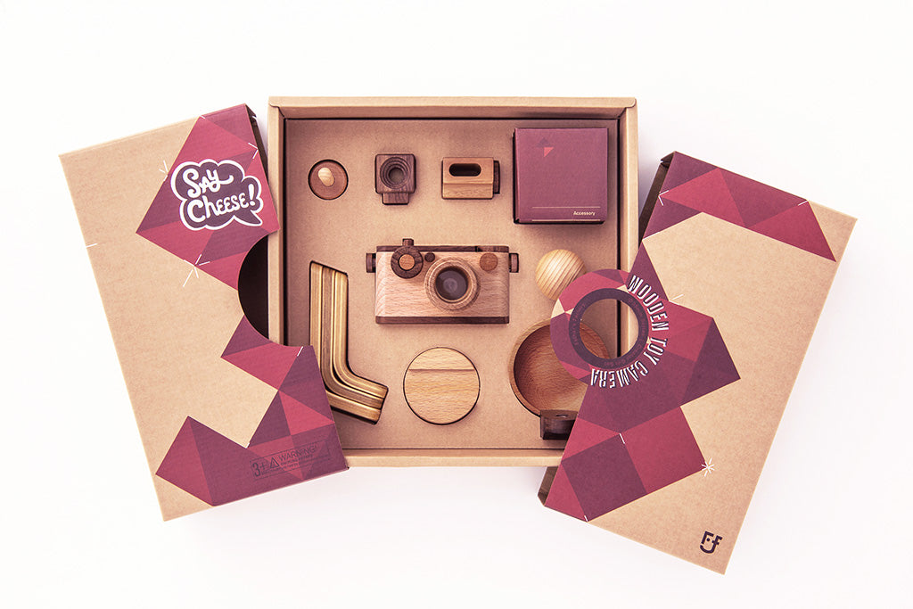 Enhance your playtime with our wooden toy camera gift set, featuring a 35mm wooden camera and four wooden flashes. This versatile set not only fuels creative play but also serves as an attractive home decor addition.