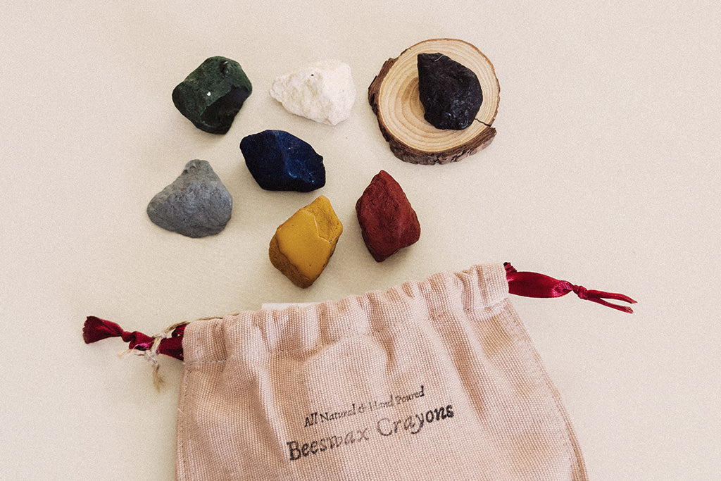 all natural hand poured beeswax crayons comes in a cotton sacks for children's creative play.