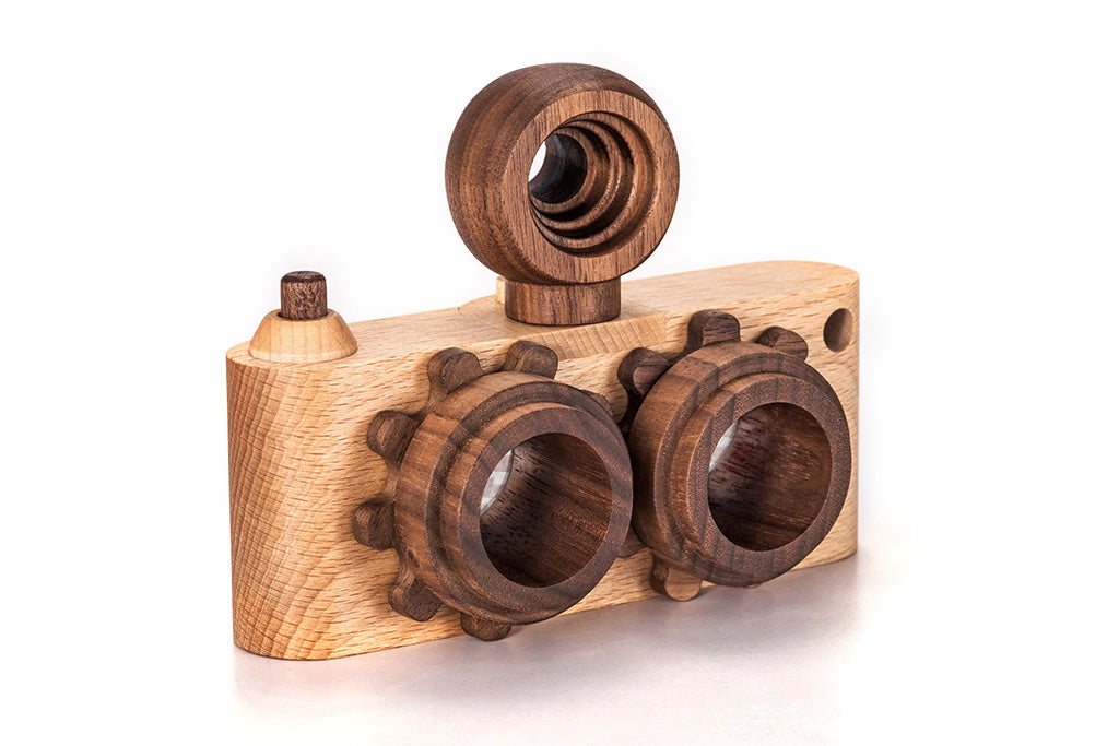 Twinkle wooden toy camera inspired by the stereo camera offers double the fun with two kaleidoscope lenses. Like a wooden binocular toy, Father’s Factory twinkle wooden toy camera has 2 lenses. Children can look through the lenses and find wonders. The kaleidoscopic lens will enhance creativity in children and offers high-quality playtime. Father's factory wooden toys can double as interior decor, kid’s room decor, and playroom display.