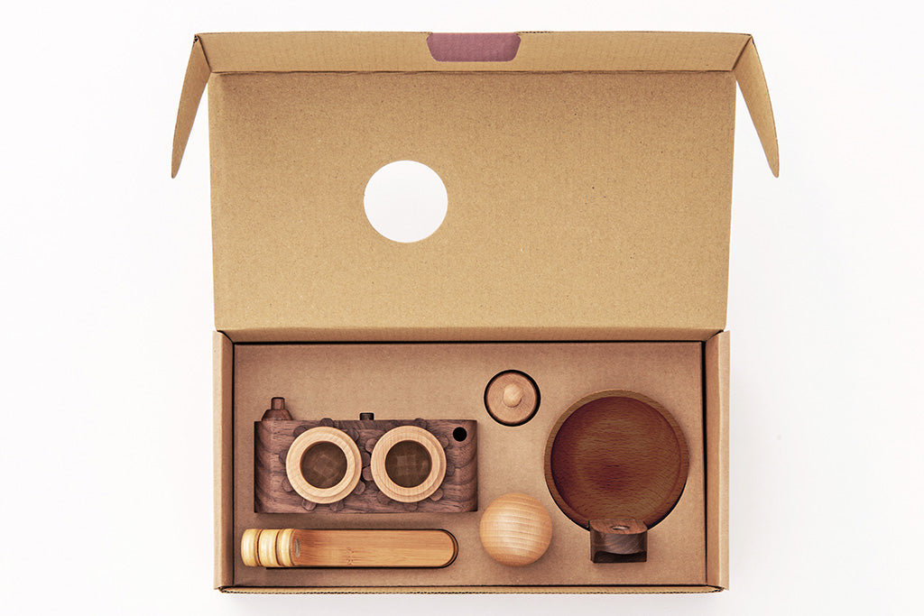 Delight your little photographers with father’s factory high-quality wooden toy camera that's sure to become a treasured keepsake. Crafted of durable, beautifully beech wood and walnut, this toy encourages all-day imaginative story-telling for your child and family. This toy camera also doubles as interior decor. each wooden toy comes with a kaleidoscopic viewfinder, a clickable button, and a movable rewind handle.