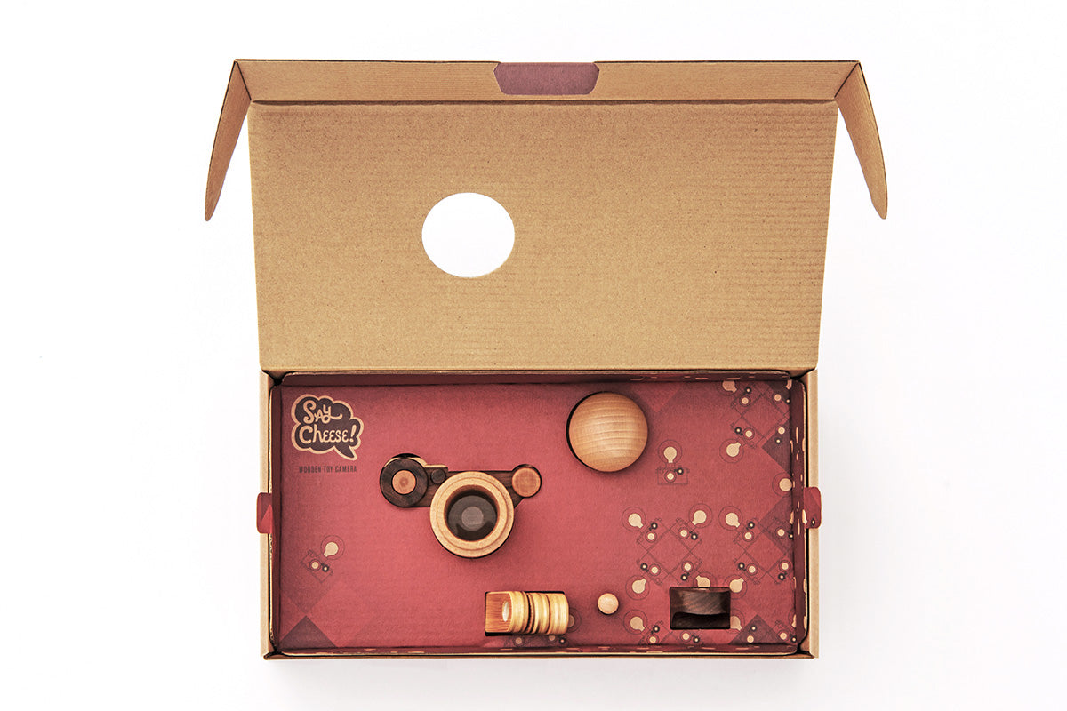 Delight your little photographers with father’s factory high-quality wooden toy camera that's sure to become a treasured keepsake. Crafted of durable, beautifully beech wood and walnut, this toy encourages all-day imaginative story-telling for your child and family. This toy camera also doubles as interior decor. each wooden toy comes with a kaleidoscopic viewfinder, a clickable button, and a movable rewind handle.