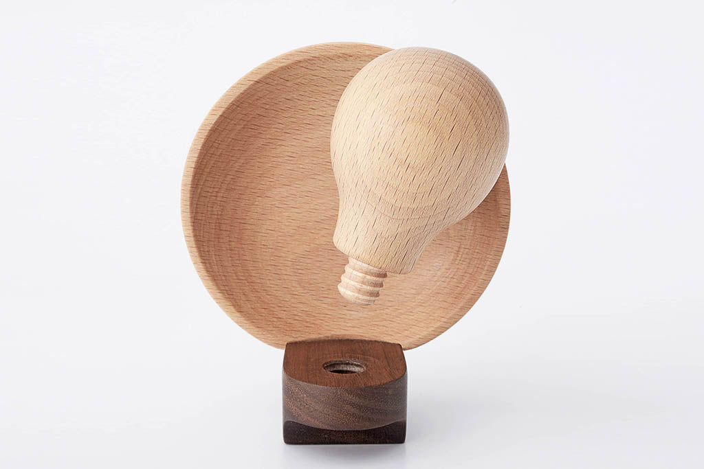 Photo shows a vintage inspired camera flash, inspired by the retro camera flash and its holder, the toy camera flash is made with high quality walnut and breech wood. It is the perfect accessory for the 35MM wooden toy camera collection. Wooden toys are safer than plastic toys because they are made of non-toxic and biodegradable materials. When choosing wooden toys, wooden toy camera is the essential type of toy for your child’s open-ended playtime. Choose from Father’s Factory wooden toy camera today as th