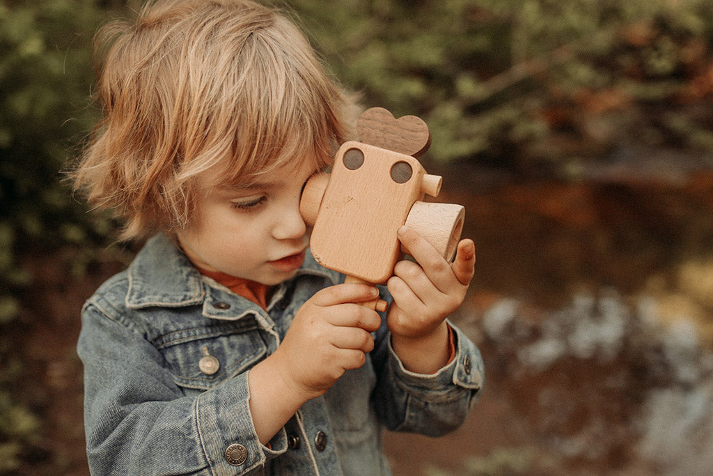 Father's Factory wooden toy camera, Super8 wooden toy camera has kaleidoscopic lens. It’s perfect of pretend play, open ended play, sensory play, and homeschooling. Montessori and Waldorf toy. It’s made of walnut and beechwood with heirloom quality. It’s a non toxic, natural, and environmental friendly toy. No Battery-Operated or Plastic Toys. Best holiday gift for kids.