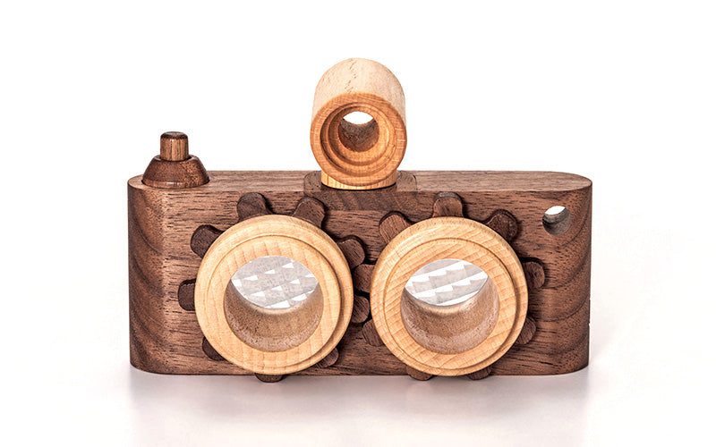 Twinkle wooden toy camera inspired by the stereo camera offers double the fun with two kaleidoscope lenses. Like a wooden binocular toy, Father’s Factory twinkle wooden toy camera has 2 lenses. Children can look through the lenses and find wonders. The kaleidoscopic lens will enhance creativity in children and offers high-quality playtime. Father's factory wooden toys can double as interior decor, kid’s room decor, and playroom display.