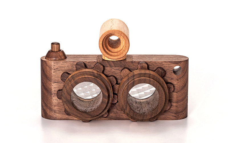 Twinkle wooden toy camera inspired by the stereo camera offers double the fun with two kaleidoscope lenses. Like a wooden binocular toy, Father’s Factory twinkle wooden toy camera has 2 lenses. Children can look through the lenses and find wonders. The kaleidoscopic lens will enhance creativity in children and offers high-quality playtime. Father's factory wooden toys can double as interior decor, kid’s room decor, and playroom display.