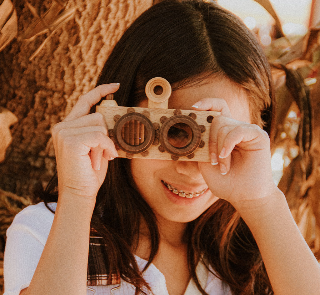 Wooden toys from father’s factory are more durable and made with high-quality woods, father factory wooden toy camera is best for children’s creative play. We designed toys that double as interior decor. Wood camera toys are the best for your children, little photographers. They are the best for kids’ pretend play. Inspired by twin-lens reflex camera, father’s factory bring back the classic in a modern and child-friendly way! This two lens camera will be your children’s next favorite toy.