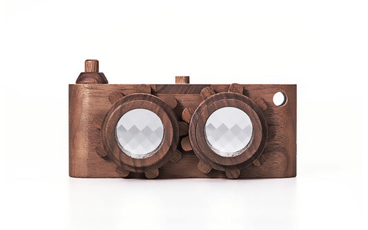 Twinkle wooden toy camera inspired by the stereo camera offers double the fun with two kaleidoscope lenses. Like a wooden binocular toy, Father’s Factory twinkle wooden toy camera has 2 lenses. Children can look through the lenses and find wonders. The kaleidoscopic lens will enhance creativity in children and offers high-quality playtime. Father's factory wooden toys can double as interior decor, kid’s room decor, and playroom display.