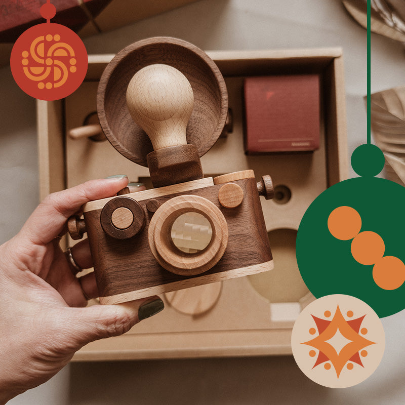 Unlock your child's creativity with our 35MM Wood Toy Camera Idea Set! Crafted from high-quality wood, this beautifully-grained toy camera is perfect for camera-loving families and is designed to be a cherished keepsake. Featuring a kaleidoscopic lens and a clickable shutter button, it encourages imaginative play and endless fun. The durable walnut body is resistant to wear and tear, making it a reliable companion for years to come.