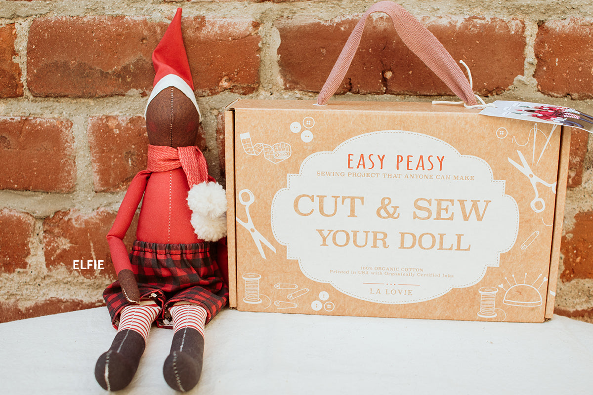 Make your Elf on the shelf uniquely yours this holiday. Designed for crafters of all ages and skill levels, this DIY sewing project offers a delightful experience, resulting in a one-of-a-kind handmade Elf on the shelf for your shelf. With the added option to personalize the doll’s face, this kit offers both creativity and fun with a festive twist!