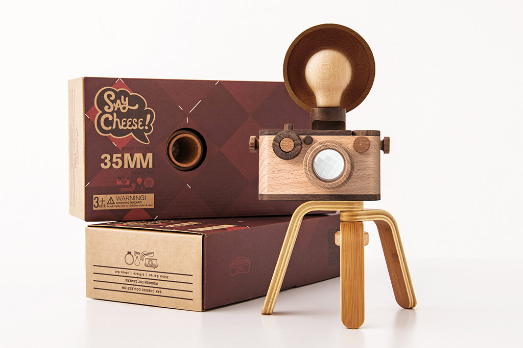 Delight your little photographers with father’s factory high-quality wooden toy camera that's sure to become a treasured keepsake. Crafted of durable, beautifully beech wood and walnut, this toy encourages all-day imaginative story-telling for your child and family. This toy camera also doubles as interior decor. each wooden toy comes with a kaleidoscopic viewfinder, a clickable button, and a movable rewind handle.