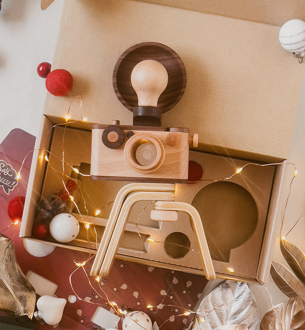 Delight your little photographers with father’s factory high-quality wooden toy camera that's sure to become a treasured keepsake. Crafted of durable, beautifully beech wood and walnut, this toy encourages all-day imaginative story-telling for your child and family. This toy camera also doubles as interior decor. each wooden toy comes with a kaleidoscopic viewfinder, a clickable button, and a movable rewind handle.