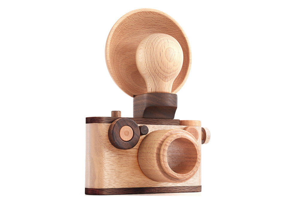 35mm Camera with A Wood Flash Bulb Reflector