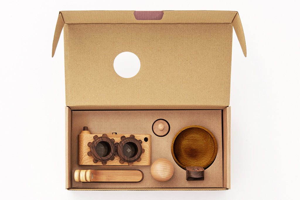 Delight your little photographers with father’s factory high-quality wooden toy camera that's sure to become a treasured keepsake. Crafted of durable, beautifully beech wood and walnut, this toy encourages all-day imaginative story-telling for your child and family. This toy camera also doubles as interior decor. each wooden toy comes with a kaleidoscopic viewfinder, a clickable button, and a movable rewind handle.