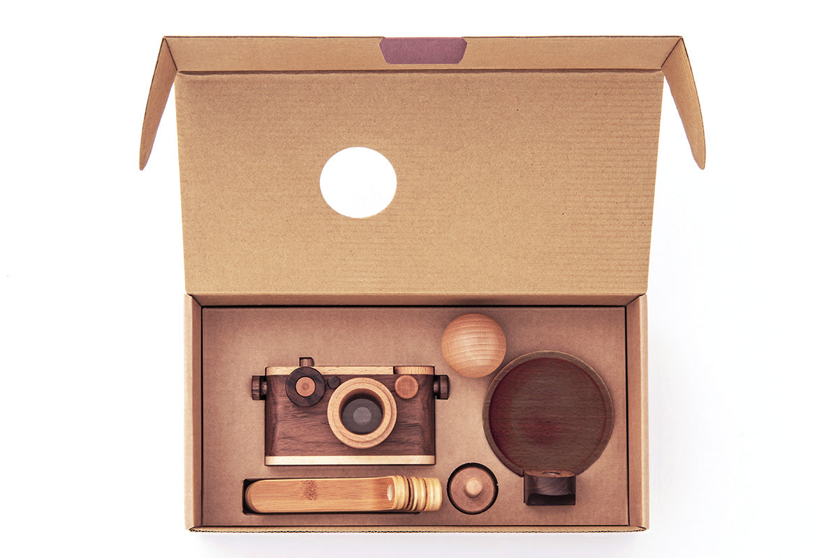 Delight your little photographers with father’s factory high-quality wooden toy camera that's sure to become a treasured keepsake. Crafted of durable, beautifully beech wood and walnut, this toy encourages all-day imaginative story-telling for your child and family. This toy camera also doubles as interior decor. each wooden toy comes with a kaleidoscopic viewfinder, a clickable button, and a movable rewind handle.