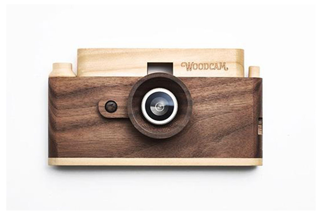 Father's Factory Woodcam is a working digital camera with handcrafted wooden case. Features 8 megapixel resolution, focus 35mm, aperture 2.8 standard.