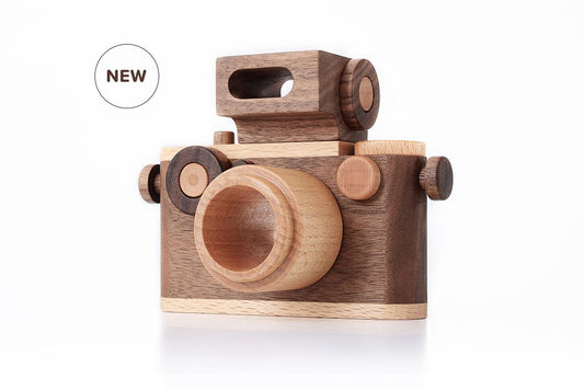 picture shows father's factory best selling wooden toy camera 35mm vintage wooden toy camera in walnut. best wooden toy camera for toddler. great for imaginative play. 